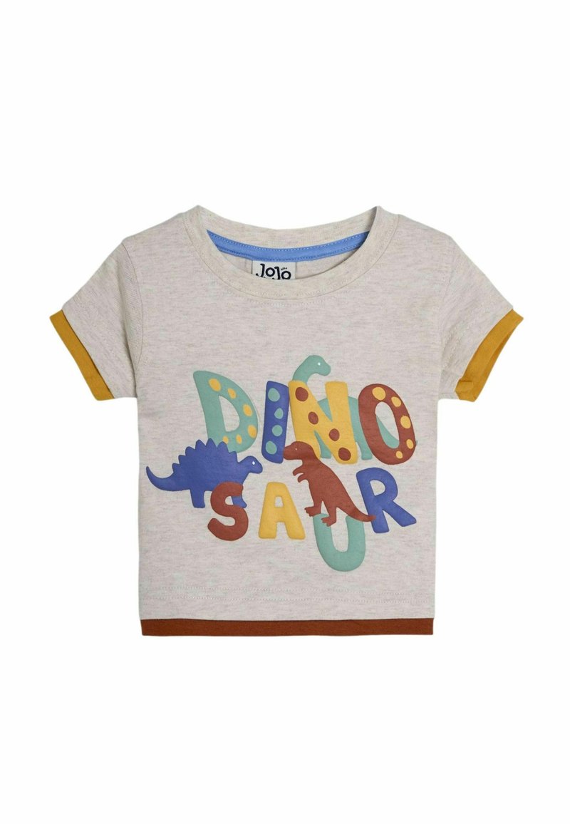 Srajca s kratkimi rokavi sive barve z večbarvnim grafičnim motivom dinozavra ter besedilom "DINO SAUR". Ima rjave in rumene detajle na rokavih in robu.