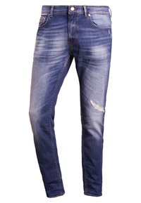 Hubené modré džíny z denimu s vybledlým umytím, odřením na koleni, tradičním pětivackovým designem a kovovým zapínáním.