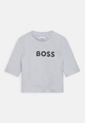 Graues Langarmhemd aus weicher Baumwolle, mit auffälligem "BOSS"-Text und geschwungenem "little"-Design auf der Vorderseite. Druckknöpfe an der Schulter.