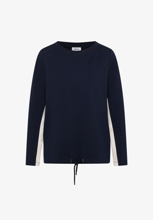 Sweat-shirt bleu marine foncé avec des manches longues, un col rond et des panneaux latéraux blancs. Comprend un détail de cordon de serrage à l'ourlet.