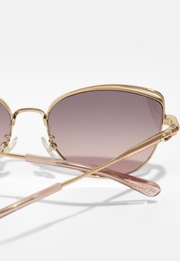 COACH Päikeseprillid - shiny light gold-coloured/rose gold-coloured/grey pink