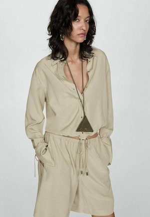 Mango Pantalon de survêtement - mottled olive