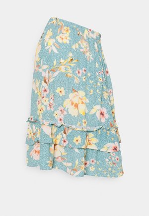 Light blue skirt with yellow and pink floral print featuring ruffled layered hem and elastic waistband.
