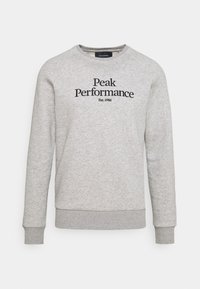 Felpa grigia con collo rotondo e maniche lunghe. Presenta testo e grafica nera "Peak Performance", polsini e orlo a costine.