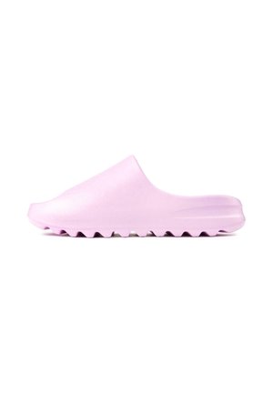 Pink rubber slide sandal with a smooth surface, rounded toe, and serrated sole for traction. Minimalist design with no visible fastenings.