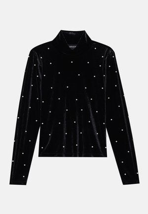 Black velvet long-sleeve turtleneck top with pearl embellishments evenly distributed across the surface. Soft texture and fitted design.