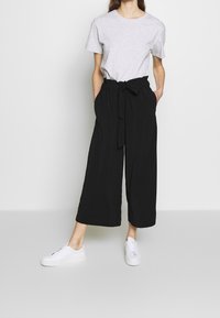 mbyM Tygbyxor - black