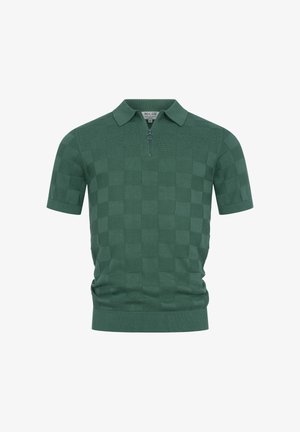 Grønn kortermet strikket polo med subtilt rutemønster og en glidelås foran med ringtrekk ved kragen.