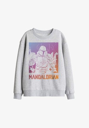 Grey sweatshirt featuring line art of a Mandalorian warrior holding Grogu with a background gradient and "The Mandalorian" text below.