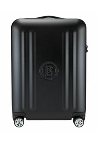 Zwarte harde koffer met verticale ribbels, een rond logo en vier multidirectionele wielen voor gemakkelijke mobiliteit.