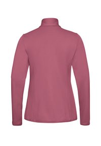 Haut à manches longues en rose clair, avec un col montant, une texture lisse et un motif en quadrillage subtil sur le tissu.