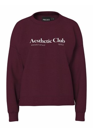 Bluza bordowa z długimi rękawami, okrągłym dekoltem i ściągaczami na rękawach. Na przodzie znajduje się biały nadruk z napisem „Aesthetic Club established 1892”.