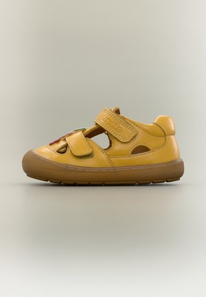 OLLIE - Încălțăminte bebeluși - dark yellow