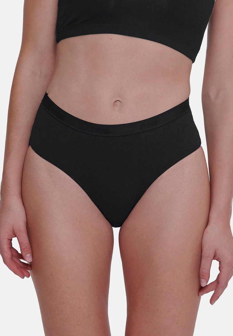 Mutande nere a vita alta, realizzate in cotone morbido con una finitura liscia. Presentano una larga vita elasticizzata con dettagli del logo.