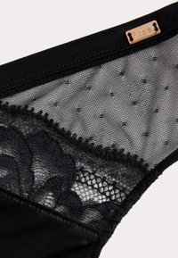 Marks & Spencer Trusser - black