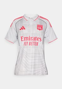 Maillot de football blanc et gris clair avec des bordures rouges, écusson de l'Olympique Lyonnais, logo Adidas et sponsor Emirates Fly Better sur le devant.