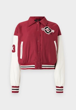 Cropped jacket in maroon with white sleeves. Features a logo patch and number "23" on the left sleeve. Striped ribbed cuffs and hem.