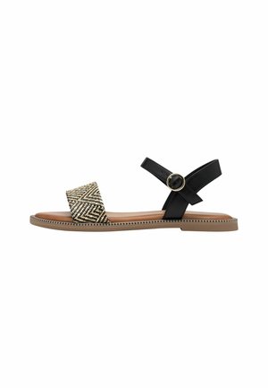Sandali neri e marroni con una fascia intrecciata a motivo e una cinghia alla caviglia regolabile con fibbia circolare. Sole piatto con cuciture decorative.