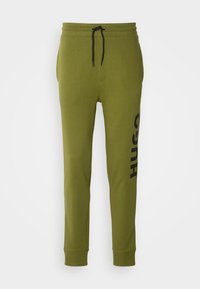 DUTSCHI - Jogginghose - open green