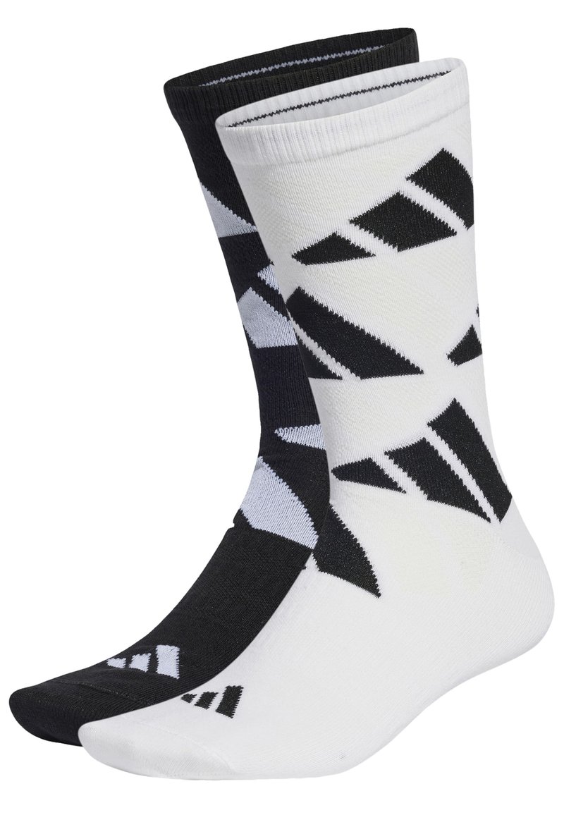 Calcetines en blanco y negro con patrones geométricos. Fabricados en tejido, cuentan con puños acanalados y puntas reforzadas. Diseñados para ofrecer comodidad y durabilidad.
