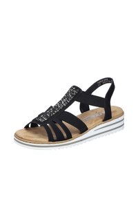 Sandal noir avec des sangles élastiques et une semelle intérieure rembourrée. Présente une bande ornée de strass sur le devant et une semelle rayée blanche.