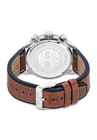 Cinturino in cuoio marrone con dettagli blu scuro, cassa in acciaio inossidabile argentato, logo incisa sul retro e pulsanti del cronografo. Resistente all'acqua fino a 5 ATM.