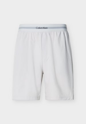 Άσπρα ανδρικά μποξεράκια με γκρι ελαστική ζώνη μέσης που φέρει το λογότυπο Calvin Klein, υφασμάτινο με ομαλή υφή και άνετη εφαρμογή.