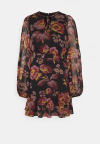 Kukallinen mekko läpikuultavasta mustasta kankaasta, jossa on pitkät hihat, röyhelöhelma ja pinkki-, punainen- ja keltakukkakuosi sekä solmittava kaulaosa.