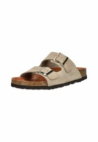 Sandale à glissière en suède beige avec deux boucles en métal argenté réglables, une semelle intermédiaire en liège et une semelle extérieure en caoutchouc texturé.