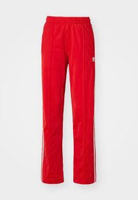 FIREBIRD LOOSE TRACK - Tracksuit bottoms - better scarlet