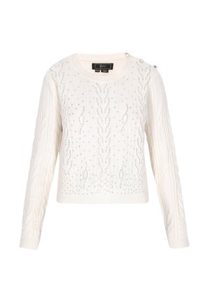 Hvid strikket sweater med kabelmønstre og rhinsten dekorationer. Har en rund hals og knapper på skulderen. Lange ærmer.