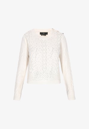 Suéter blanco de punto con patrones de cable y adornos de rhinestones. Presenta un cuello redondo y botones en el hombro. Mangas largas.
