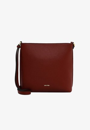 Red leather crossbody bag with a textured surface, gold hardware, and an adjustable strap. Features a minimalist design and logo detail.