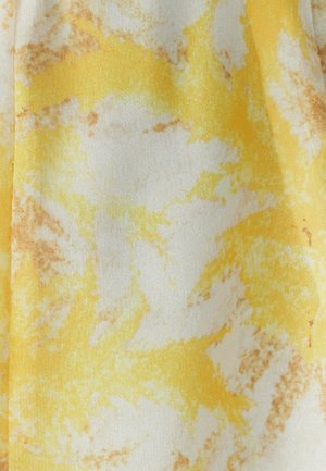 Yellow and white fabric with a soft, textured surface, featuring a marbled pattern with hints of light brown.