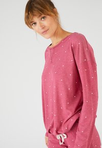 Damart IMPRIMÉ ÉTOILES THERMOLACTYL SET - Pigiama - rouge