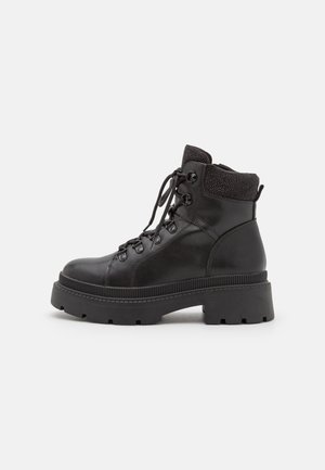 Bottines à plateau - black