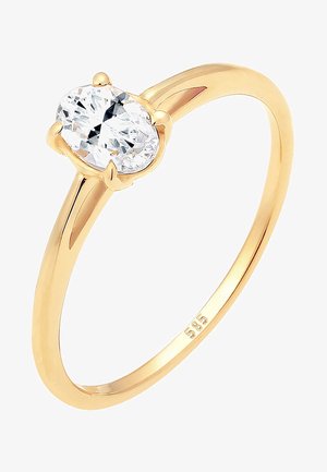 Guldring med en ovalslibet klar ædelsten sat i en fire-prongs mount, med en glat, poleret ring og en 585 stempling.