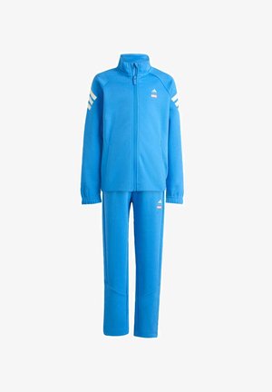 Survêtement en polaire bleu comprenant une veste zippée avec poignets côtelés, poches latérales, et un pantalon assorti avec des détails de coutures discrètes et des accents de logo.