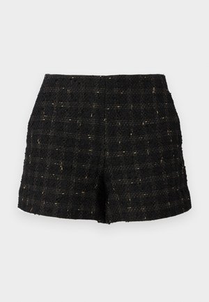 Shorts en tweed noir avec une surface texturée, ornés d'un motif en grille en fils dorés, de coupe ajustée et taille mi-haute.