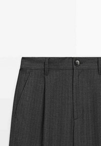 Dark gray pinstripe tailored trousers with front button closure, belt loops, and side pockets visible on a white background.