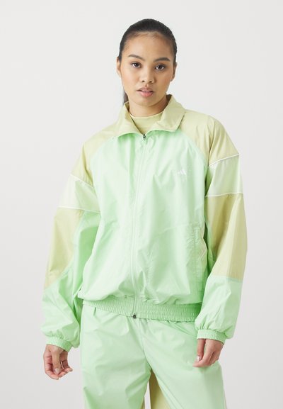 adidas by Stella McCartney TRACKTOP - Training jacket - glow green/halo gold