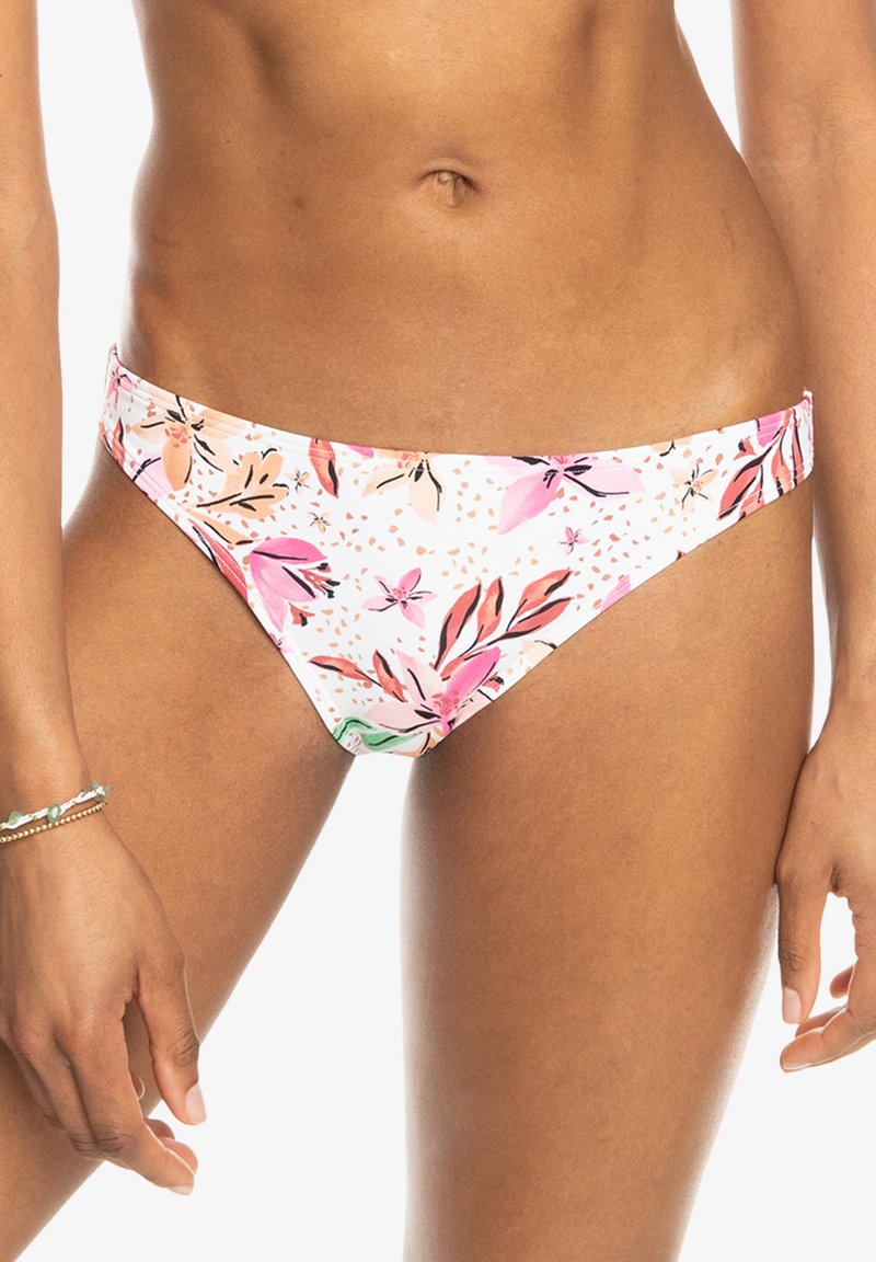 Bikiniunderdel för kvinnor i ett vitt tyg med rosa och orange blommönster, med låg midja och slät textur.
