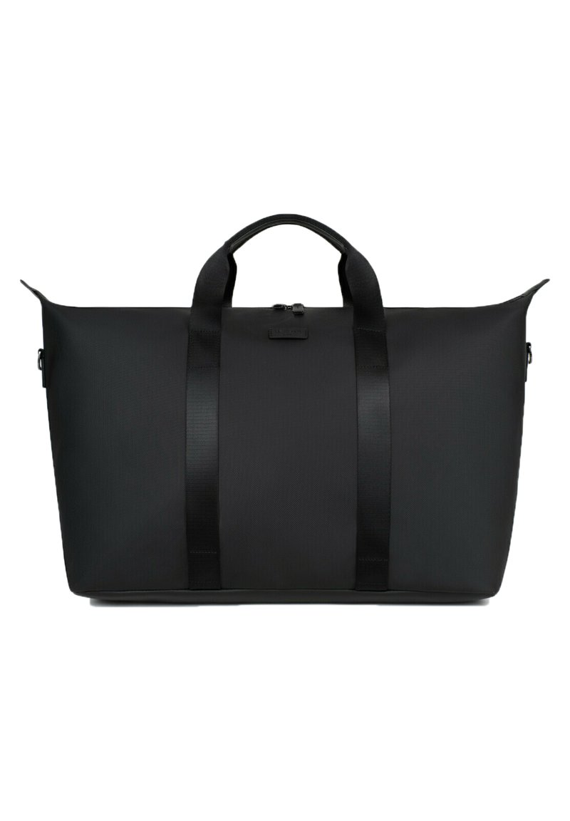 Borsa duffel nera con una finitura liscia e opaca. Presenta due manici superiori, una chiusura con zip e un design minimalista senza loghi visibili.