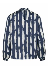 Blouse bleu marine à manches longues avec motifs verticaux de coups de pinceau blancs, encolure froncée et poignets élastiques, vue de dos.