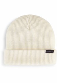 Beanie lavorato a maglia color crema con un motivo testurizzato, dotato di risvolto e di una piccola etichetta nera con il logo Puma lateralmente.