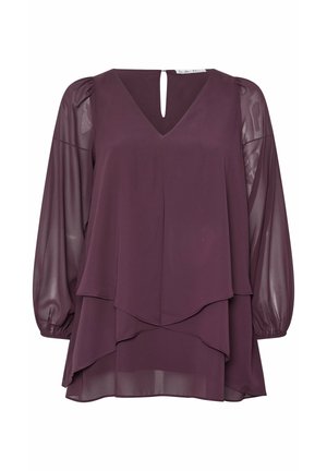 Diep paarse blouse in gelaagd ontwerp met een V-hals, poefmouwen en een sleutelgat achter. Gemaakt van een lichtgewicht, doorschijnende stof.