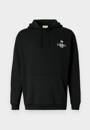 Sweatshirt preta com capuz, feita de algodão, com um bolso canguru frontal. Apresenta uma estampa gráfica branca com a palavra "ATHENS" e um desenho acima.