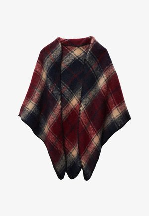 Poncho en tartan rouge, marine et beige. Melange de laine doux, à l'avant ouvert avec des bords festonnés et des détails brodés sur le devant.