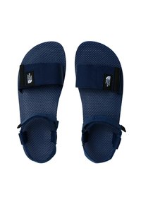 Granatowe sandały z teksturowaną podeszwą, regulowanymi paskami i etykietą z logo marki. Lekka konstrukcja idealna do codziennego noszenia.