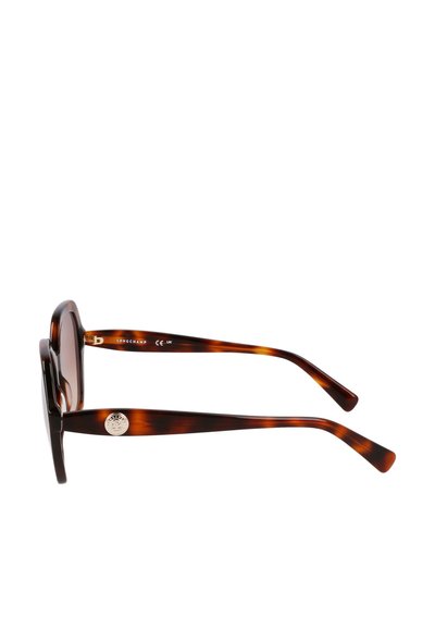 Occhiali da sole tartarugati con forma rettangolare, montatura spessa e texture decorata. Presentano dettagli in metallo sulle aste.
